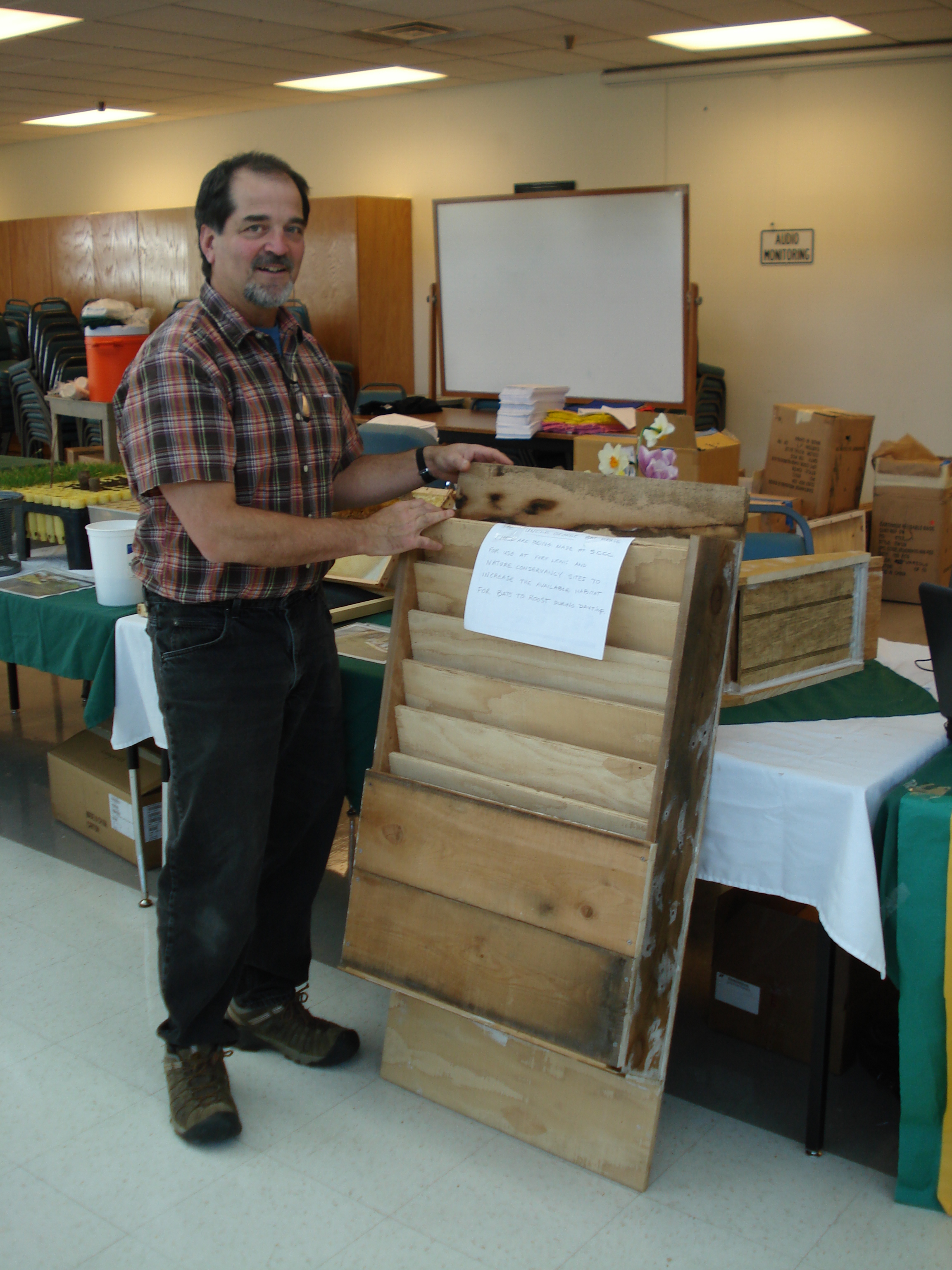 Greg Falxa explains a "bat condo," one of many constructed at Stafford Creek