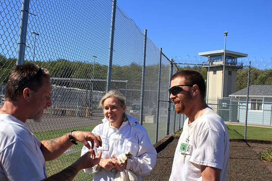 Claudia Supensky, Olympia Beekeeper’s Associate, talks with inmates about beekeeping practices at SCCC.