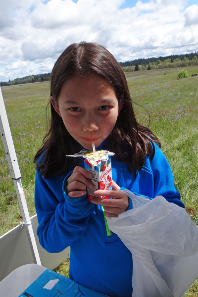 A visitor enjoys her creation.