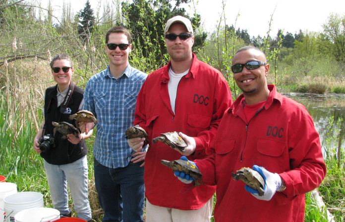 Anthony, Fiona, Tim, and Jamar prepare to release the turtles.