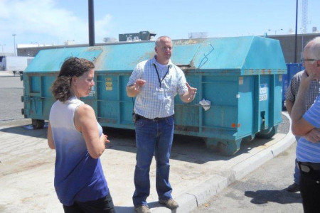 "Sustainability guru" for CRCC, Sam Harris, talks with Linda Glasier from WA Dept. of Ecology and JBLM's Solid Waste & Recycling Program Manager Ron Norton.