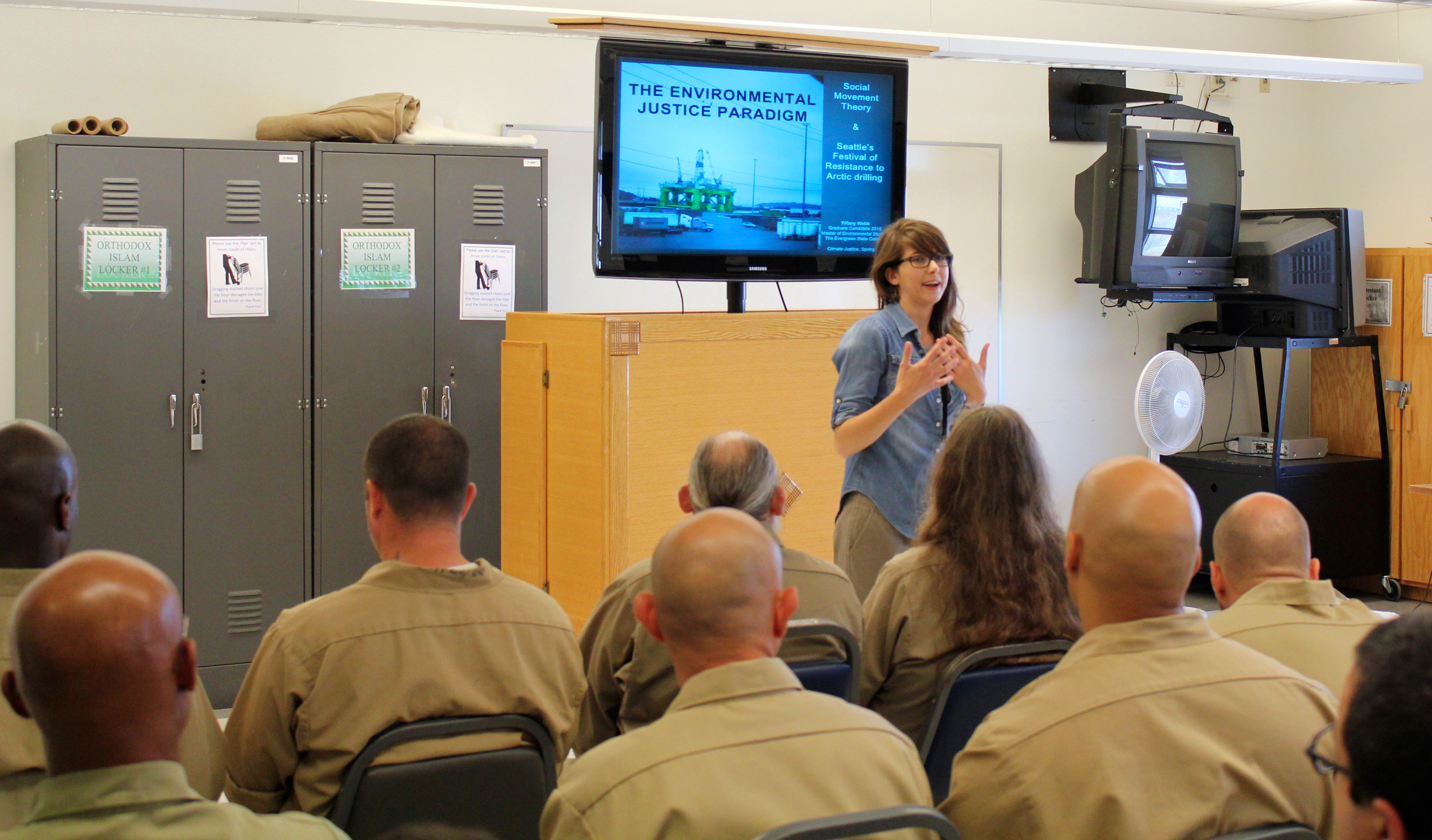 Tiffany Webb presenting on the environmental justice paradigm and climate justice.