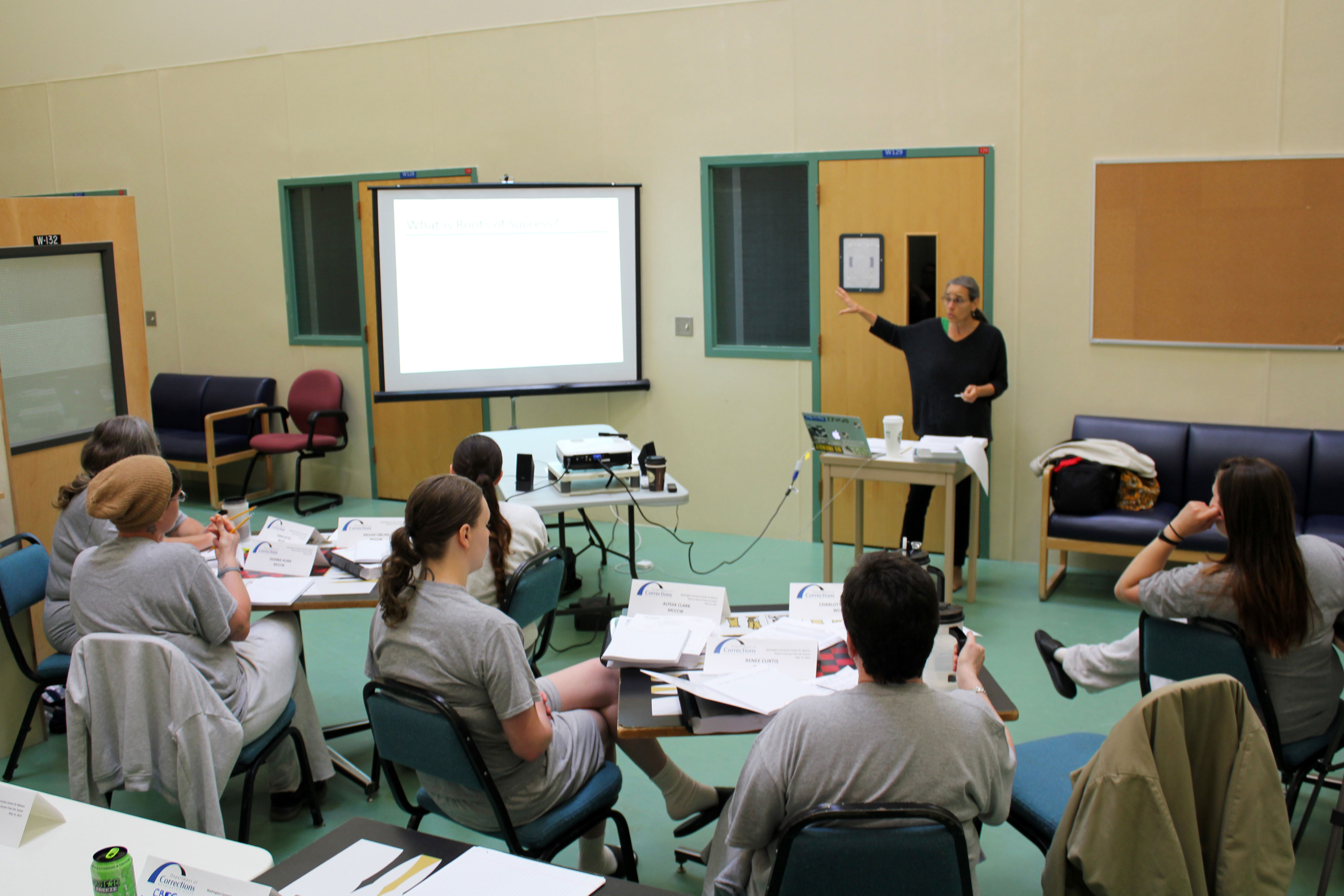 Professor of Urban Studies and Planning at San Francisco State University and the Founder and Executive Director of Roots of Success Raquel Pinderhughes teaches a class of future Roots of Success instructors.