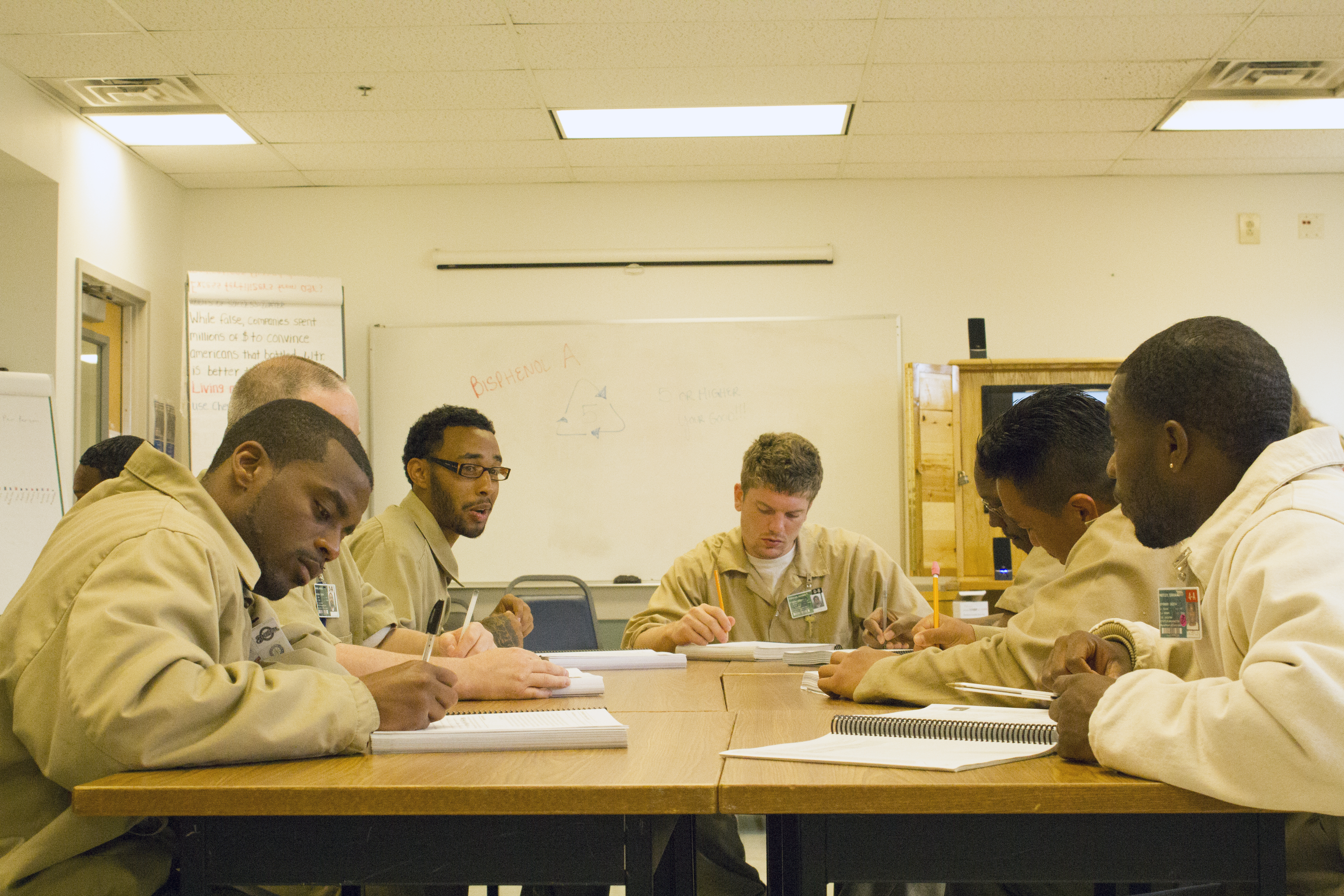 Roots of Success students study together in a group.